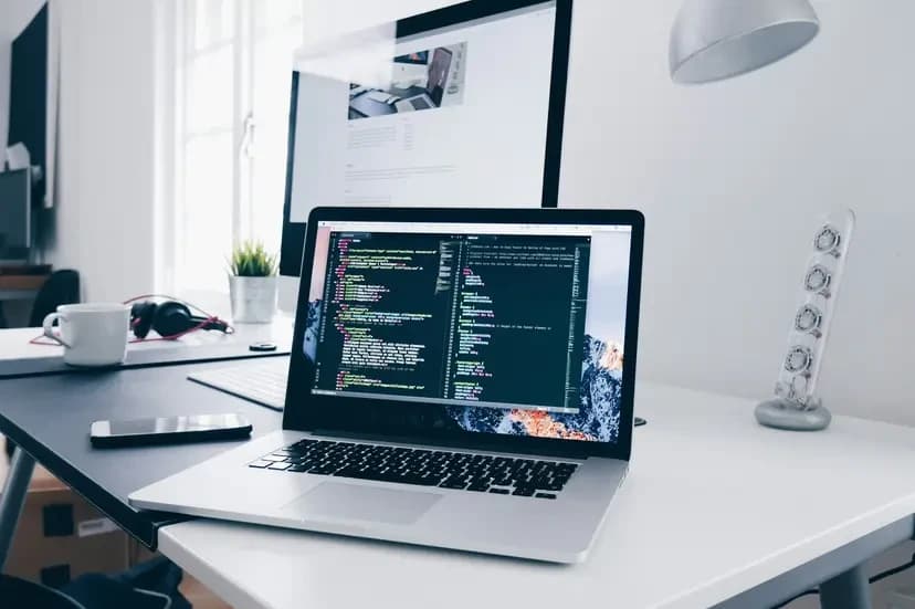 Laptop workspace representing a focused client collaboration portal